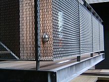 Expanded metal sheet RAISEDsteelfor railingwith diamond-shaped perforations