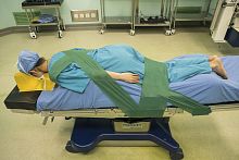 Operating table fixation strap iFIXbody