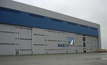 Sliding industrial door ESAVIAN : TYPE 126steelwaterprooffor hangar