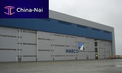 Sliding industrial door ESAVIAN : TYPE 126steelwaterprooffor hangar
