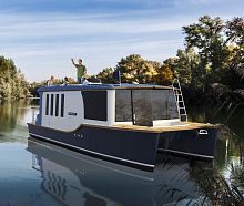Catamaran express cruiser KRONLAND IIoutboarddisplacement hullflybridge