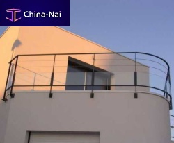 Glass panel balcony with barssteel