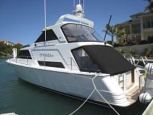 Inboard express cruiser Te Whara IIItwin-enginedisplacement hullwith enclosed flybridge