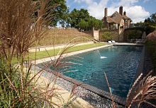 Natural swimming pool LANDSCAPED GARDENSoutdoorin-groundstone