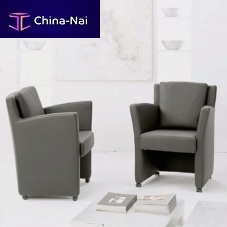 Contemporary armchair NATALIEleatherfabricbridge