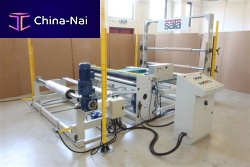 Film rewinder-winder motorizedroller