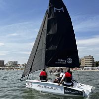 Disabled person sailing dinghy Malupamultiplerecreationalinstructional
