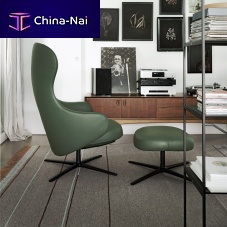 Contemporary relaxing armchair Dua Relaxleatherfabricwith footrest