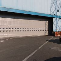 Fold-up industrial door SAILDOOR®galvanised steelPVCwind-proof
