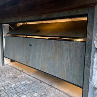 Overlap garage door PIETRAVERAstonesheet steelautomatic