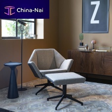 Contemporary armchair UNCLE JESSEfabricpowder-coated steelwith footrest