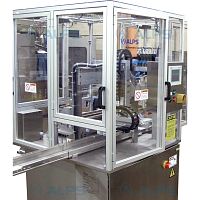 Disc deflashing machine for bottlesfor vialscompact